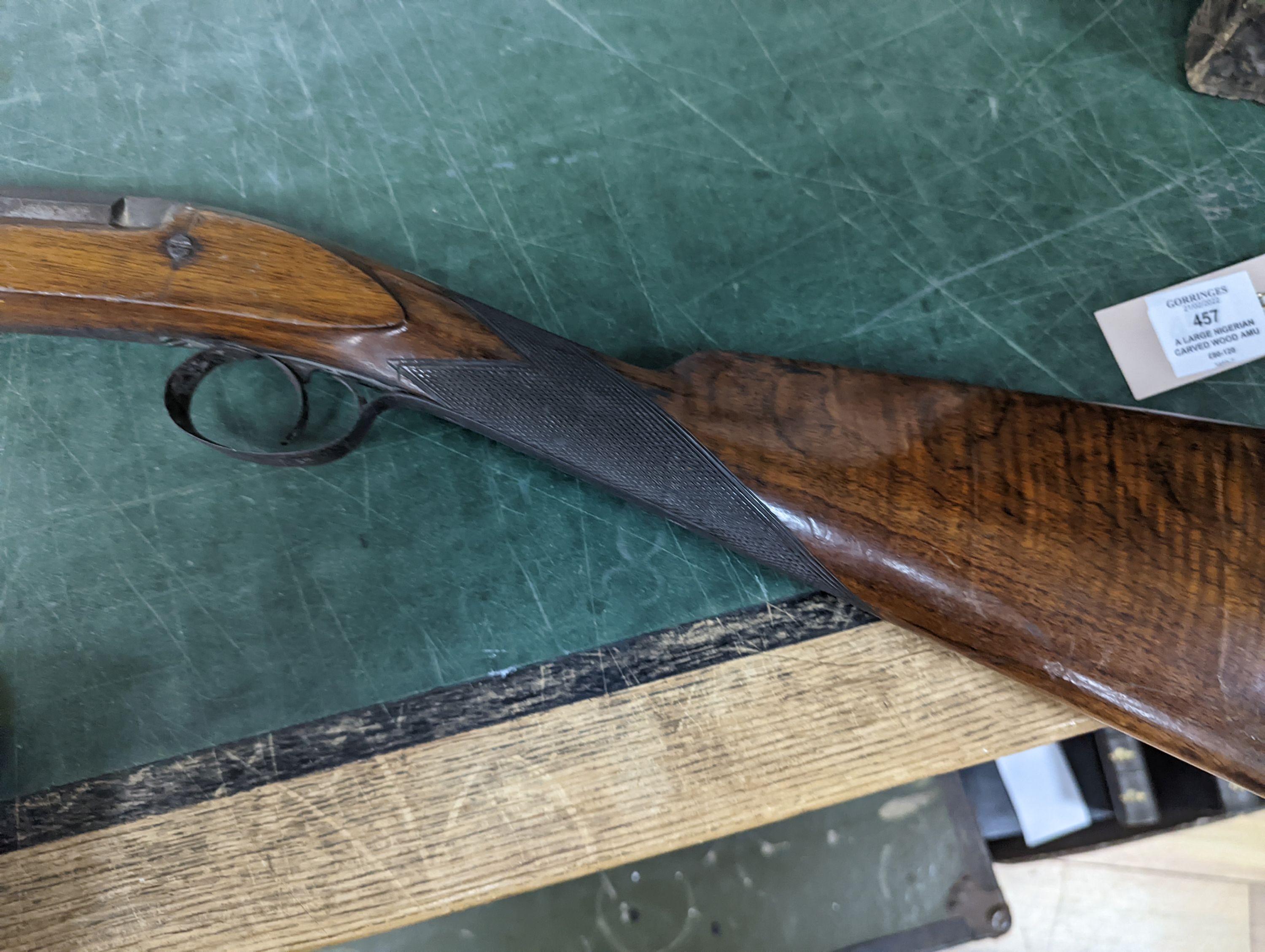 Two 19th century percussion muskets, 103cm. max., one double-barrelled